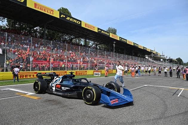 03 09 2023, Autodromo Nazionale di Monza, Monza, FORMULA 1 PIRELLI GRAN PREMIO D ITALIA 2023 ,in the picture The Italian high jumper Gianmarco Tamberi jumps over a Formula 1 car Monza Autodromo Nazionale di Monza Italy  eu-images-506