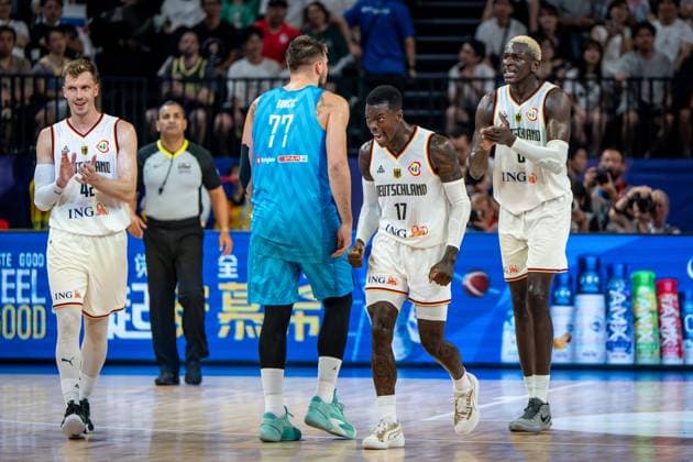 Basketball Okinawa 03 09 2023 FIBA Basketball World Cup 2023 Mens World Cup Round 2 Germany GER Slovenia SLO Cheers Dennis Schröder Schroeder Germany, No 17 Schröder Schroder Isaac Bonga Germany, No 00 Andreas Obst Germany, No 42 LUKA DONCIC Slovenia, No 77