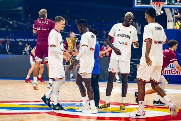Basketball Manila Pasay 06 09 2023 FIBA Basketball World Cup 2023 Mens World Cup Quarterfinals Germany GER Latvia LAT World Cup trophy in background Andreas Obst Germany, No 42 Dennis Schröder Schroeder Germany, No 17 Schröder Schroder Isaac Bonga Germany, No 00 Johannes Thiemann Germany, No 32
