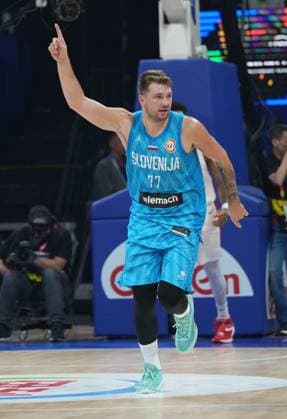(230906) -- MANILA, Sept. 6, 2023 -- Slovenia s Luka Doncic celebrates during the quarterfinal between Canada and Slovenia at the 2023 FIBA World Cup in Manila, the Philippines, Sept. 6, 2023. ) (SP)PHILIPPINES-MANILA-BASKETBALL-FIBA WORLD CUP-QUARTERFINAL-CAN VS SLO MengxYongmin 