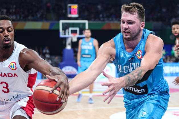 (230906) -- MANILA, Sept. 6, 2023 -- Slovenia s Luka Doncic (R) vies for the ball during the quarterfinal between Canada and Slovenia at the 2023 FIBA World Cup in Manila, the Philippines, Sept. 6, 2023. ) (SP)PHILIPPINES-MANILA-BASKETBALL-FIBA WORLD CUP-QUARTERFINAL-CAN VS SLO WuxZhuang 