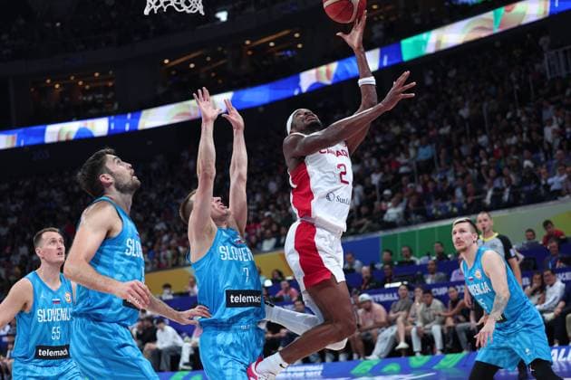 (230906) -- MANILA, Sept. 6, 2023 -- Canada s Shai Gilgeous-Alexander (2nd R) goes for a lay up during the quarterfinal between Canada and Slovenia at the 2023 FIBA World Cup in Manila, the Philippines, Sept. 6, 2023. ) (SP)PHILIPPINES-MANILA-BASKETBALL-FIBA WORLD CUP-QUARTERFINAL-CAN VS SLO WuxZhuang 
