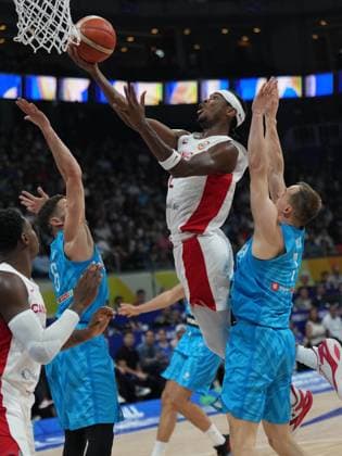 (230906) -- MANILA, Sept. 6, 2023 -- Canada s Shai Gilgeous-Alexander (2nd R) goes for a lay up during the quarterfinal between Canada and Slovenia at the 2023 FIBA World Cup in Manila, the Philippines, Sept. 6, 2023. ) (SP)PHILIPPINES-MANILA-BASKETBALL-FIBA WORLD CUP-QUARTERFINAL-CAN VS SLO MengxYongmin 