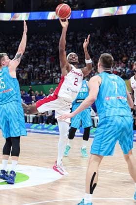 (230906) -- MANILA, Sept. 6, 2023 -- Canada s Shai Gilgeous-Alexander (C) shoots during the quarterfinal between Canada and Slovenia at the 2023 FIBA World Cup in Manila, the Philippines, Sept. 6, 2023. ) (SP)PHILIPPINES-MANILA-BASKETBALL-FIBA WORLD CUP-QUARTERFINAL-CAN VS SLO WuxZhuang 