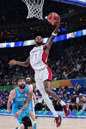 (230906) -- MANILA, Sept. 6, 2023 -- Canada s Nickeil Alexander-Walker (top) goes for a lay up during the quarterfinal between Canada and Slovenia at the 2023 FIBA World Cup in Manila, the Philippines, Sept. 6, 2023. ) (SP)PHILIPPINES-MANILA-BASKETBALL-FIBA WORLD CUP-QUARTERFINAL-CAN VS SLO WuxZhuang 