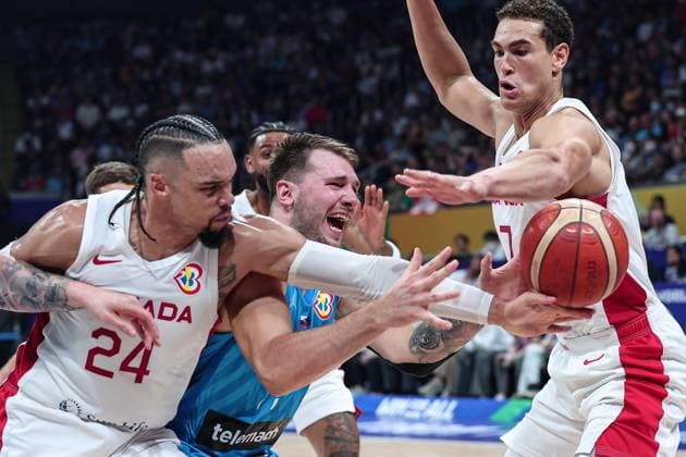 (230906) -- MANILA, Sept. 6, 2023 -- Slovenia s Luka Doncic (C) vies for the ball during the quarterfinal between Canada and Slovenia at the 2023 FIBA World Cup in Manila, the Philippines, Sept. 6, 2023. ) (SP)PHILIPPINES-MANILA-BASKETBALL-FIBA WORLD CUP-QUARTERFINAL-CAN VS SLO WuxZhuang 