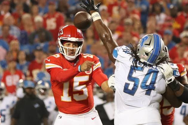 KANSAS CITY, MO - SEPTEMBER 07: Kansas City Chiefs quarterback Patrick Mahomes (15) gets a pass around Detroit Lions defensive tackle Alim McNeill (54) to tight end Blake Bell (81) for a 4-yard touchdown in the second quarter of an NFL, American Football Herren, USA game between the Detroit Lions and Kansas City Chiefs on Sep 7, 2023 at GEHA Field at Arrowhead Stadium in Kansas City, MO. (Photo by Scott Winters Icon Sportswire) NFL: SEP 07 Lions at Chiefs EDITORIAL USE ONLY Icon2309070242