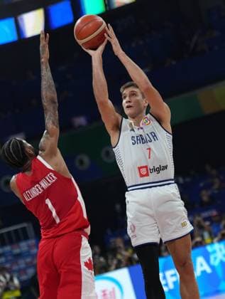 (230908) -- MANILA, Sept. 8, 2023 -- Serbia s Bogdan Bogdanovic (R) shoots during the semifinal between Serbia and Canada at the 2023 FIBA World Cup in Manila, the Philippines, Sept. 8, 2023. ) (SP)PHILIPPINES-MANILA-BASKETBALL-FIBA WORLD CUP-SEMIFINAL-SRB VS CAN MengxYongmin 