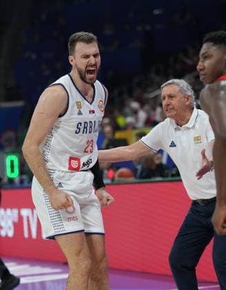 (230908) -- MANILA, Sept. 8, 2023 -- Serbia s Marko Guduric (L) celebrates during the semifinal between Serbia and Canada at the 2023 FIBA World Cup in Manila, the Philippines, Sept. 8, 2023. ) (SP)PHILIPPINES-MANILA-BASKETBALL-FIBA WORLD CUP-SEMIFINAL-SRB VS CAN MengxYongmin 
