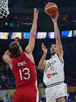 (230908) -- MANILA, Sept. 8, 2023 -- Serbia s Ognjen Dobric (R) shoots during the semifinal between Serbia and Canada at the 2023 FIBA World Cup in Manila, the Philippines, Sept. 8, 2023. ) (SP)PHILIPPINES-MANILA-BASKETBALL-FIBA WORLD CUP-SEMIFINAL-SRB VS CAN MengxYongmin 