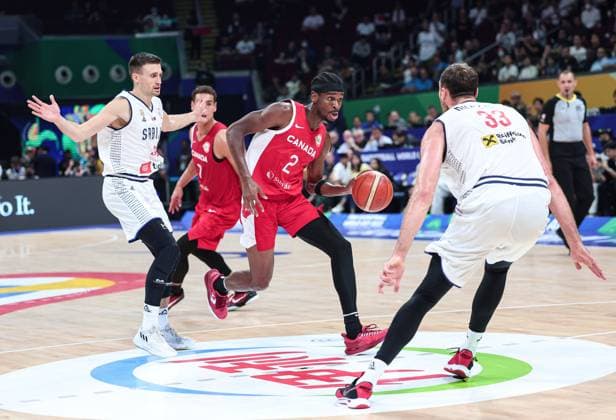 (230908) -- MANILA, Sept. 8, 2023 -- Canada s Shai Gilgeous-Alexander (front C) breaks through during the semifinal between Serbia and Canada at the 2023 FIBA World Cup in Manila, the Philippines, Sept. 8, 2023. ) (SP)PHILIPPINES-MANILA-BASKETBALL-FIBA WORLD CUP-SEMIFINAL-SRB VS CAN WuxZhuang 