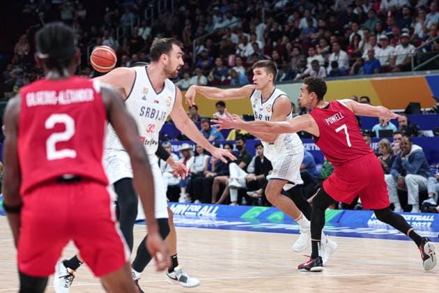 (230908) -- MANILA, Sept. 8, 2023 -- Serbia s Bogdan Bogdanovic (2nd R) passes the ball during the semifinal between Serbia and Canada at the 2023 FIBA World Cup in Manila, the Philippines, Sept. 8, 2023. ) (SP)PHILIPPINES-MANILA-BASKETBALL-FIBA WORLD CUP-SEMIFINAL-SRB VS CAN WuxZhuang 