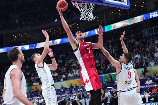 (230908) -- MANILA, Sept. 8, 2023 -- Canada s Dwight Powell (2nd R) shoots during the semifinal between Serbia and Canada at the 2023 FIBA World Cup in Manila, the Philippines, Sept. 8, 2023. ) (SP)PHILIPPINES-MANILA-BASKETBALL-FIBA WORLD CUP-SEMIFINAL-SRB VS CAN WuxZhuang 