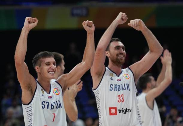 (230908) -- MANILA, Sept. 8, 2023 -- Serbia s Bogdan Bogdanovic (L) and Nikola Milutinov celebrate winning the semifinal between Serbia and Canada at the 2023 FIBA World Cup in Manila, the Philippines, Sept. 8, 2023. ) (SP)PHILIPPINES-MANILA-BASKETBALL-FIBA WORLD CUP-SEMIFINAL-SRB VS CAN MengxYongmin 