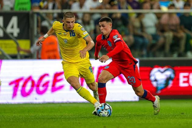 Ukraine v England UEFA European 2024 Qualifier 09 09 2023. Phil Foden (20) of England goes past Vitaliy Mykolenko of Ukraine during the UEFA European 2024 Qualifier match between Ukraine and England at Wroclaw Stadium, Wroclaw, Poland on 9 September 2023. Editorial use only , Copyright: xNigelxKeenex PSI-17984-0136