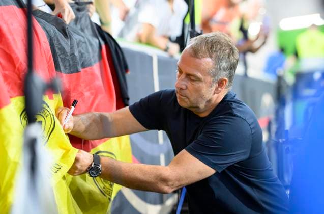 Coach Hans Dieter Hansi FLICK GER signs autographs after the match Football friendly match, Germany GER Japan JPN 1 4, on 09 09 2023 in Wolfsburg Germany Â