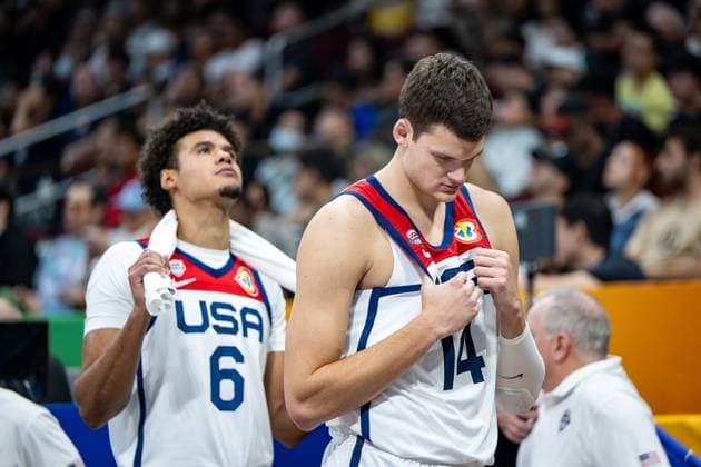 Basketball Manila Pasay 10 09 2023 FIBA Basketball World Cup 2023 Mens World Cup Match for 3rd Place Bronze United States of America USA Canada CAN WALKER KESSLER USA, No 14 CAMERON JOHNSON USA, No 06 knocked down