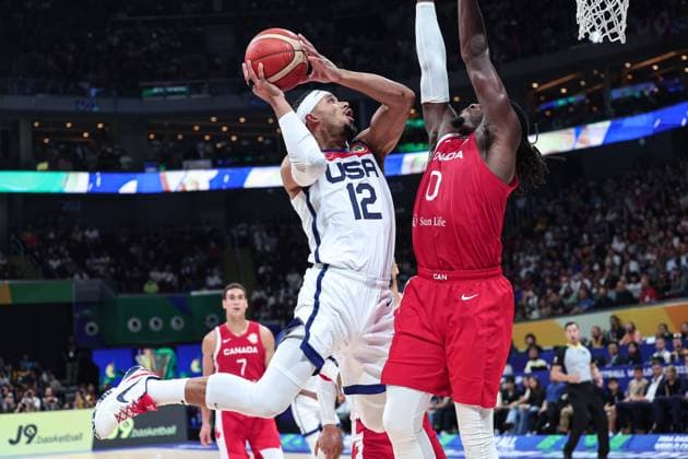 (230910) -- MANILA, Sept. 10, 2023 -- Josh Hart (front L) of the United States shoots during the 3rd place game between the United States and Canada at the 2023 FIBA World Cup in Manila, the Philippines, Sept. 10, 2023. ) (SP)PHILIPPINES-MANILA-BASKETBALL-FIBA WORLD CUP-3RD PLACE GAME-USA VS CAN WuxZhuang 