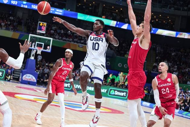 (230910) -- MANILA, Sept. 10, 2023 -- Anthony Edwards (2nd L) of the United States passes the ball during the 3rd place game between the United States and Canada at the 2023 FIBA World Cup in Manila, the Philippines, Sept. 10, 2023. ) (SP)PHILIPPINES-MANILA-BASKETBALL-FIBA WORLD CUP-3RD PLACE GAME-USA VS CAN WuxZhuang 