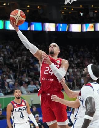 (230910) -- MANILA, Sept. 10, 2023 -- Dillon Brooks (C) of Canada goes for a lay up during the 3rd place game between the United States and Canada at the 2023 FIBA World Cup in Manila, the Philippines, Sept. 10, 2023. ) (SP)PHILIPPINES-MANILA-BASKETBALL-FIBA WORLD CUP-3RD PLACE GAME-USA VS CAN MengxYongmin 