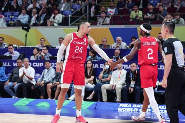 (230910) -- MANILA, Sept. 10, 2023 -- Dillon Brooks (L) celebrates with Shai Gilgeous-Alexander of Canada during the 3rd place game between the United States and Canada at the 2023 FIBA World Cup in Manila, the Philippines, Sept. 10, 2023. ) (SP)PHILIPPINES-MANILA-BASKETBALL-FIBA WORLD CUP-3RD PLACE GAME-USA VS CAN WuxZhuang 