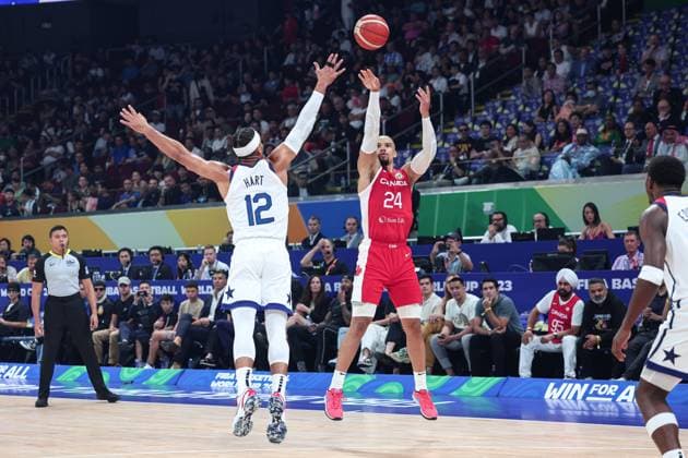 (230910) -- MANILA, Sept. 10, 2023 -- Dillon Brooks (R) of Canada shoots during the 3rd place game between the United States and Canada at the 2023 FIBA World Cup in Manila, the Philippines, Sept. 10, 2023. ) (SP)PHILIPPINES-MANILA-BASKETBALL-FIBA WORLD CUP-3RD PLACE GAME-USA VS CAN WuxZhuang 