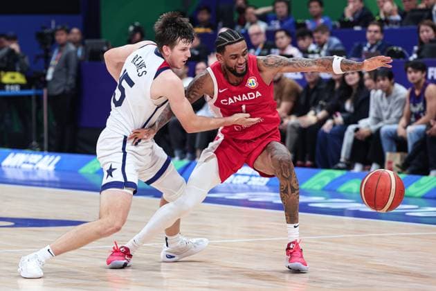 (230910) -- MANILA, Sept. 10, 2023 -- Austin Reaves (L) of the United States vies with Nickeil Alexander-Walker of Canada during the 3rd place game between the United States and Canada at the 2023 FIBA World Cup in Manila, the Philippines, Sept. 10, 2023. ) (SP)PHILIPPINES-MANILA-BASKETBALL-FIBA WORLD CUP-3RD PLACE GAME-USA VS CAN WuxZhuang 