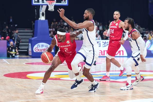 (230910) -- MANILA, Sept. 10, 2023 -- Shai Gilgeous-Alexander (1st L) of Canada breaks through during the 3rd place game between the United States and Canada at the 2023 FIBA World Cup in Manila, the Philippines, Sept. 10, 2023. ) (SP)PHILIPPINES-MANILA-BASKETBALL-FIBA WORLD CUP-3RD PLACE GAME-USA VS CAN WuxZhuang 
