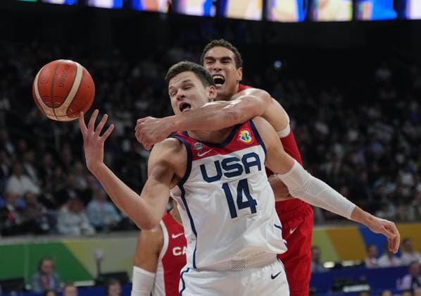 (230910) -- MANILA, Sept. 10, 2023 -- Walker Kessler (front) of the United States competes during the 3rd place game between the United States and Canada at the 2023 FIBA World Cup in Manila, the Philippines, Sept. 10, 2023. ) (SP)PHILIPPINES-MANILA-BASKETBALL-FIBA WORLD CUP-3RD PLACE GAME-USA VS CAN MengxYongmin 