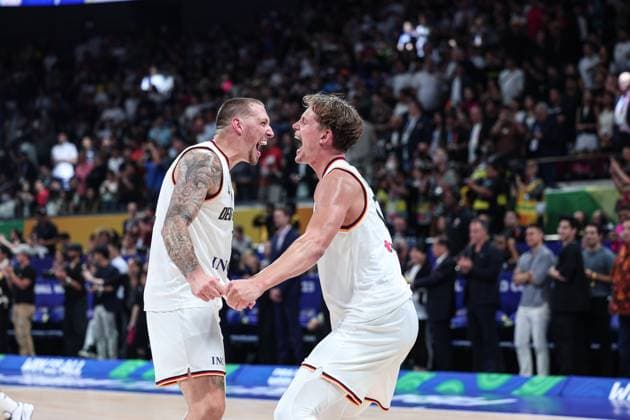 (230911) -- MANILA, Sept. 11, 2023 -- Moritz Wagner (R) and Daniel Theis of Germany celebrate after the final between Germany and Serbia at the 2023 FIBA World Cup in Manila, the Philippines, Sept. 10, 2023. ) (SP)PHILIPPINES-MANILA-FIBA BASKETBALL WORLD CUP-FINAL-GER VS SRB WuxZhuang 