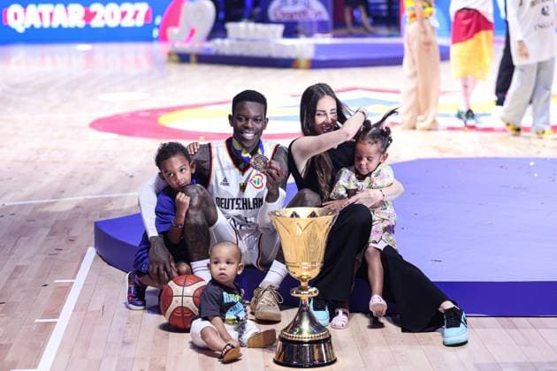 (230911) -- MANILA, Sept. 11, 2023 -- Dennis Schroder of Germany poses for a family photo after the awarding ceremony following the final between Germany and Serbia at the 2023 FIBA World Cup in Manila, the Philippines, Sept. 10, 2023. ) (SP)PHILIPPINES-MANILA-FIBA BASKETBALL WORLD CUP-FINAL-GER VS SRB WuxZhuang 