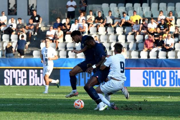 Tio Cipot of Slovenia (R) in action against Warren Zaire-Emery of France (L) during the 2025 UEFA European Under-21 Championship Qualification football match Group H between Slovenia and France FOOTBALL : SlovÃ nie vs France - Championnat d Europe des moins de 21 ans UEFA - Match de qualification Groupe H - 11 09 2023 NatasaKupljenik Panoramic 
