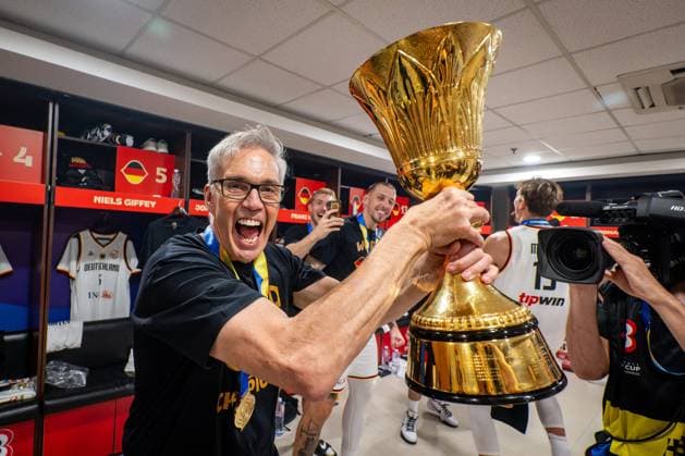 Basketball Manila Pasay 10 09 2023 FIBA Basketball World Cup 2023 Mens World Cup Final Germany GER Serbia SRB Germany wins the game 83 77 and is basketball world champion 2023 After the game in the team cabin of Team Germany cabin Gordon Herbert Germany, national coach trophy