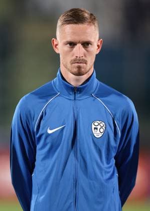 Serravalle, Italy, 10th September 2023. Zan Karnicnik of Slovenia looks on during the line up prior to the UEFA EURO, EM, Europameisterschaft,Fussball 2024 match at San Marino Stadium, Serravalle. Picture credit should read: Jonathan Moscrop Sportimage EDITORIAL USE ONLY. No use with unauthorised audio, video, data, fixture lists, club league logos or live services. Online in-match use limited to 120 images, no video emulation. No use in betting, games or single club league player publications. SPI-2558-0075