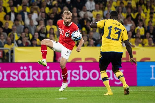 230912 Konrad Laimer of Austria and Ken Sema of Sweden during the UEFA Euro Qualifier football match between Sweden and Austria on September 12, 2023 in Stockholm Photo Jesper Zerman BILDBYRAN code JZ JM0531 bbeng fotboll football soccer fotball em kval kval uefa euro qualifier sverige sweden sverige a österrike austria  Copyright: JESPERxZERMAN BB230912JZ023