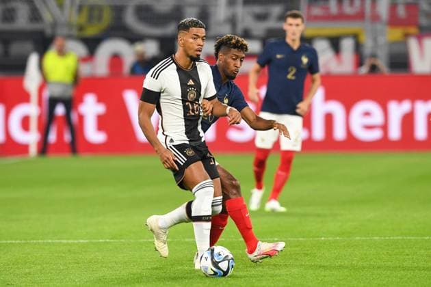 Football, men, 2023 2024 season, international match in Dortmund, Germany France, v l Benjamin Henrichs Germany and Kingsley Coman France in duel, battle for the ball, 12 09 2023, Copyright: xSebastianxRäppold MatthiasxKochx