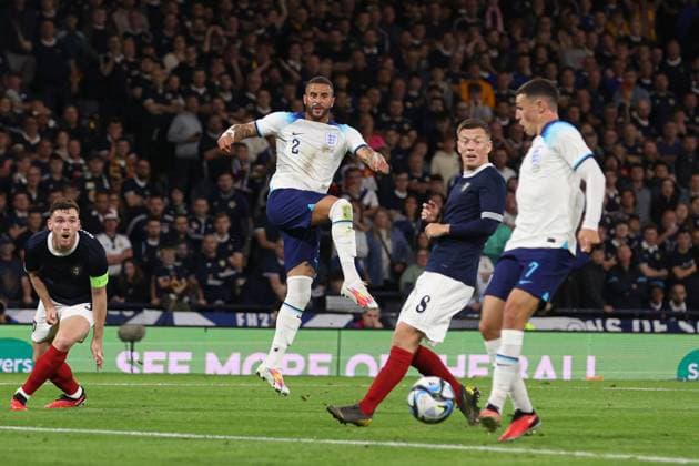 Mandatory Credit: Photo by Paul Currie Shutterstock (14094531ao) Kyle Walker of England hits the ball toward Phil Foden to score the 1st goal Scotland v England, International Friendly, Länderspiel, Nationalmannschaft Football, Hampden Park, Glasgow, UK - 12 Sep 2023 EDITORIAL USE ONLY No use with unauthorised audio, video, data, fixture lists, club league logos or live services. Online in-match use limited to 120 images, no video emulation. No use in betting, games or single club league player publications. Scotland v England, International Friendly, Football, Hampden Park, Glasgow, UK - 12 Sep 2023 EDITORIAL USE ONLY No use with unauthorised audio, video, data, fixture lists, club league logos or live services. Online in-match use limited to 120 images, no video emulation. No use in betting, games or single club league player publications. Copyright: xPaulxCurrie Shutterstockx 14094531ao