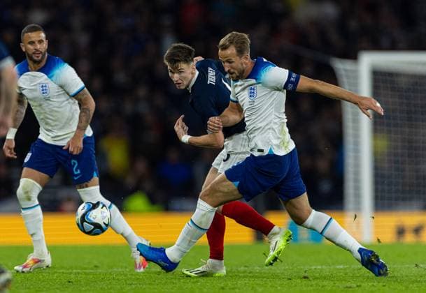 (230913) -- GLASGOW, Sept. 13, 2023 -- England s Harry Kane (R) is challenged by Scotland s Kieran Tierney during a friendly match between Scotland and England in Glasgow, Britain, on Sept. 12, 2023. (SP)BRITAIN-GLASGOW-FOOTBALL-FRIENDLY MATCH-SCOTLAND VS ENGLAND str 