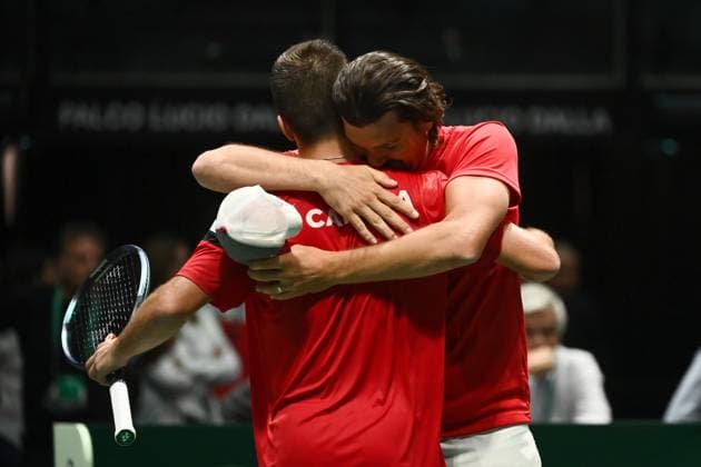 Foto Massimo Paolone LaPresse 13 Settembre 2023 - Bologna, Italia - tennis - Canada vs Italia - Alexis Galarneau (CAN) v Lorenzo Sonego (ITA) - Coppa Davis 2023 - Unipol Arena. Nella foto: Alexis Galarneau e Frank Dancevic esultano per la vittoria September 13, 2023 Bologna, Italy - sport, tennis - Canada vs Italy - Alexis Galarneau (CAN) v Lorenzo Sonego (ITA) - Davis Cup 2023 - Unipol Arena. In the pic: Alexis Galarneau and Frank Dancevic celebrate for the victory  Copyright: xMassimoxPaolone LaPressex
