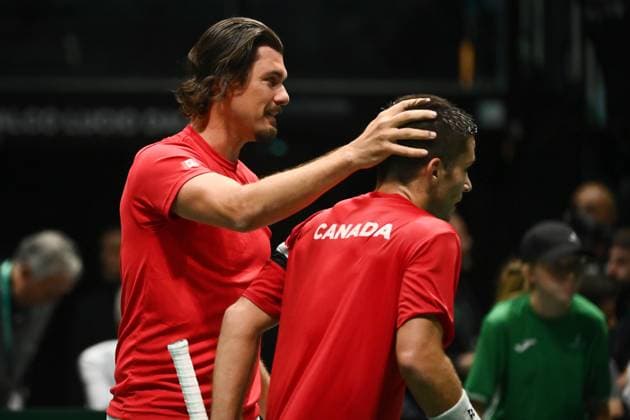 Foto Massimo Paolone LaPresse 13 Settembre 2023 - Bologna, Italia - tennis - Canada vs Italia - Alexis Galarneau (CAN) v Lorenzo Sonego (ITA) - Coppa Davis 2023 - Unipol Arena. Nella foto: Alexis Galarneau e Frank Dancevic esultano per la vittoria September 13, 2023 Bologna, Italy - sport, tennis - Canada vs Italy - Alexis Galarneau (CAN) v Lorenzo Sonego (ITA) - Davis Cup 2023 - Unipol Arena. In the pic: Alexis Galarneau and Frank Dancevic celebrate for the victory  Copyright: xMassimoxPaolone LaPressex