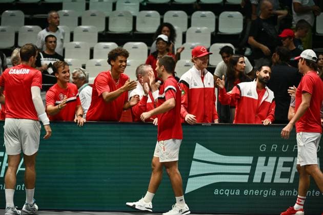 Foto Massimo Paolone LaPresse 13 Settembre 2023 - Bologna, Italia - tennis - Canada vs Italia - Alexis Galarneau Vasek Pospisil (CAN) v Simone Bolelli Matteo Arnaldi (ITA) - Coppa Davis 2023 - Unipol Arena. Nella foto: Alexis Galarneau, Vasek Pospisil, Frank Dancevic esultano per la vittoria September 13, 2023 Bologna, Italy - sport, tennis - Canada vs Italy - Alexis Galarneau Vasek Pospisil (CAN) v Simone Bolelli Matteo Arnaldi (ITA) - Davis Cup 2023 - Unipol Arena. In the pic: Alexis Galarneau, Vasek Pospisil, Frank Dancevic celebrate for the victory  Copyright: xMassimoxPaolone LaPressex