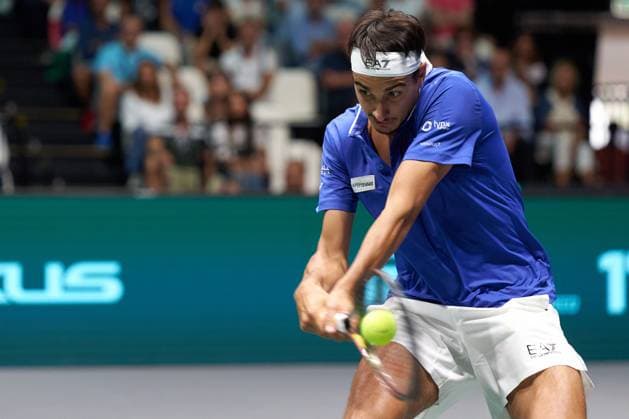 Lorenzo Sonego of Italy returns a backhand to Alexis Galarneau of Canada during the Davis Cup Group Stage 2023 Bologna match between Italy and Canada at Unipol Arena on September 13, 2023 in Bologna, Italy. (Photo by Camilla Stolen Imago) Bologna ITALY Copyright: xCamillaxStolenx L1360144