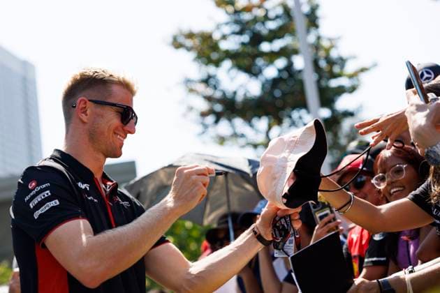 15th September 2023; Marina Bay Street Circuit, Singapore; 2023 Formula 1 Singapore Airlines Singapore Grand Prix; Free Practice Day; Number 27 Haas driver Nico Hulkenberg arrives at the track  ActionPlus12553350 StephenxBlackberry