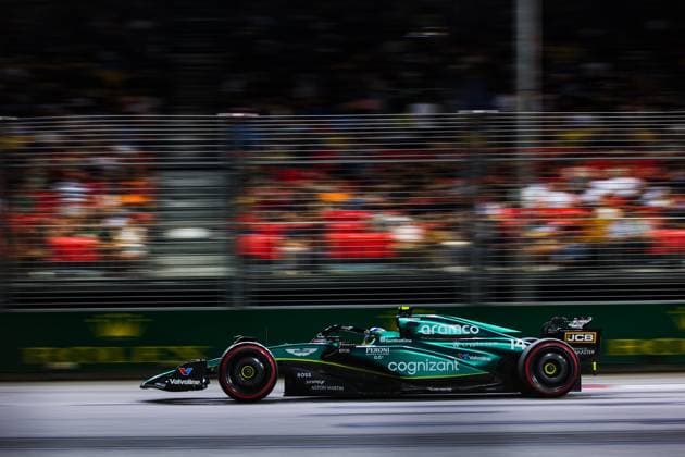14 ALONSO Fernando (spa), Aston Martin F1 Team AMR23, action during the 2023 Formula 1 Singapore Airlines Singapore Grand Prix, 15th round of the 2023 Formula One World Championship, WM, Weltmeisterschaft from September 15 to 17, 2023 on the Marina Bay Street Circuit, in Singapore - F1 - SINGAPORE GRAND PRIX 2023 DPPI Panoramic  00123034_AV6_5832