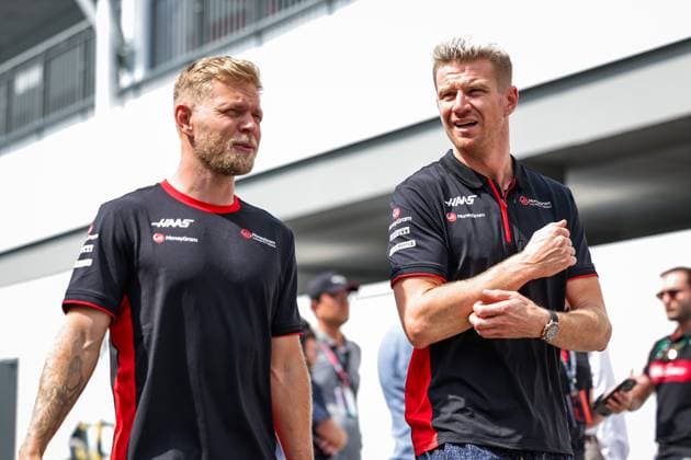 MAGNUSSEN Kevin (den), Haas F1 Team VF-23 Ferrari, HULKENBERG Nico (ger), Haas F1 Team VF-23 Ferrari, portrait during the 2023 Formula 1 Singapore Airlines Singapore Grand Prix, 15th round of the 2023 Formula One World Championship, WM, Weltmeisterschaft from September 15 to 17, 2023 on the Marina Bay Street Circuit, in Singapore - F1 - SINGAPORE GRAND PRIX 2023 DPPI Panoramic  00123034_GOOD2227