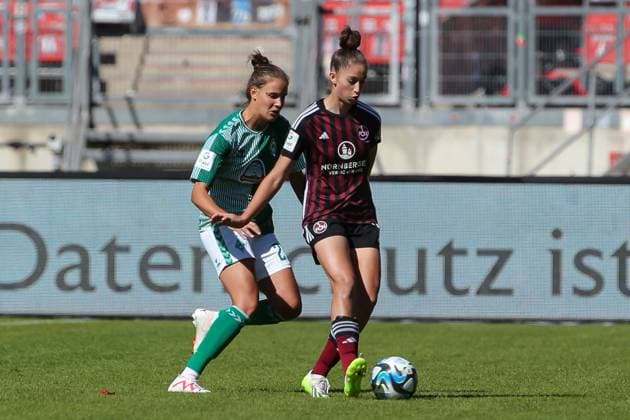 f l Hanna Nemeth SV Werder Bremen, 23 and Emma Kusch 1 FC Nürnberg, 9 in duel, duel, dynamic, action, game scene, THE DFB DIRECTIVES PROHIBIT ANY USE OF PHOTOGRAPHS AS IMAGE SEQUENCES AND OR QUASI VIDEO , 16 09 2023, Nuremberg Germany , Football, Google Pixel Womens Bundesliga, 1 FC Nürnberg SV Werder Bremen xobx