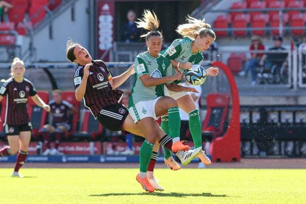 f l Lara Schmidt 1 FC Nürnberg, 27 , Maja Sternad SV Werder Bremen, 11 and Nina Lührßen SV Werder Bremen, 27 in duel, duel, dynamic, action, game scene, THE DFB REGULATIONS PROHIBIT ANY USE OF PHOTOGRAPHS AS IMAGE SEQUENCES AND OR QUASI VIDEO , 16 09 2023, Nuremberg Germany , Football, Google Pixel Womens Bundesliga, 1 FC Nürnberg SV Werder Bremen xobx