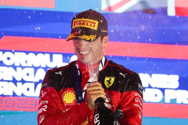 podium SAINZ Carlos (spa), Scuderia Ferrari SF-23, portrait during the 2023 Formula 1 Singapore Airlines Singapore Grand Prix, 15th round of the 2023 Formula One World Championship, WM, Weltmeisterschaft from September 15 to 17, 2023 on the Marina Bay Street Circuit, in Singapore - F1 - SINGAPORE GRAND PRIX 2023 - RACE DPPI Panoramic  00123035_AV3_9905
