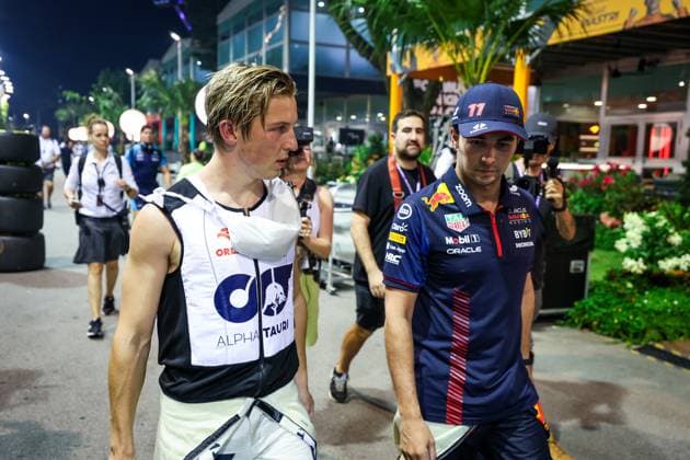 40 Liam Lawson NZL, Scuderia AlphaTauri , 11 Sergio Perez MEX, Oracle Red Bull Racing , F1 Grand Prix of Singapore at Marina Bay Street Circuit on September 17, 2023 in Singapore, Singapore Photo by HOCH ZWEI Singapore Singapore