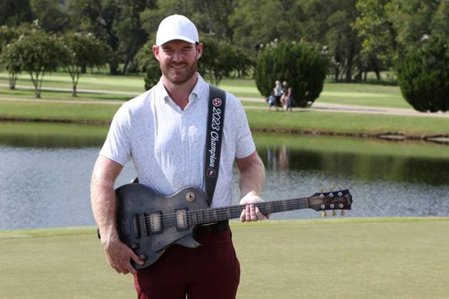 COLLEGE GROVE, TN - SEPTEMBER 17: Grayson Murray holds the championship trophy guitar following the final round of the Korn Ferry Tour Finals Simmons Bank Open, September 17, 2023 at The Grove in College Grove, Tennessee. (Photo by Matthew Maxey Icon Sportswire) GOLF: SEP 17 Simmons Bank Open EDITORIAL USE ONLY Icon23091740